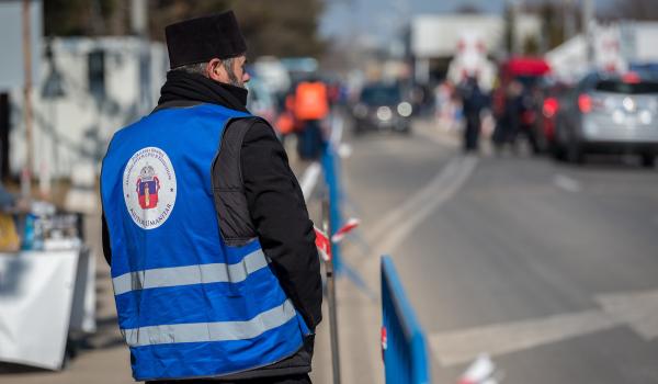 Aid worker at the border crossing in Romania