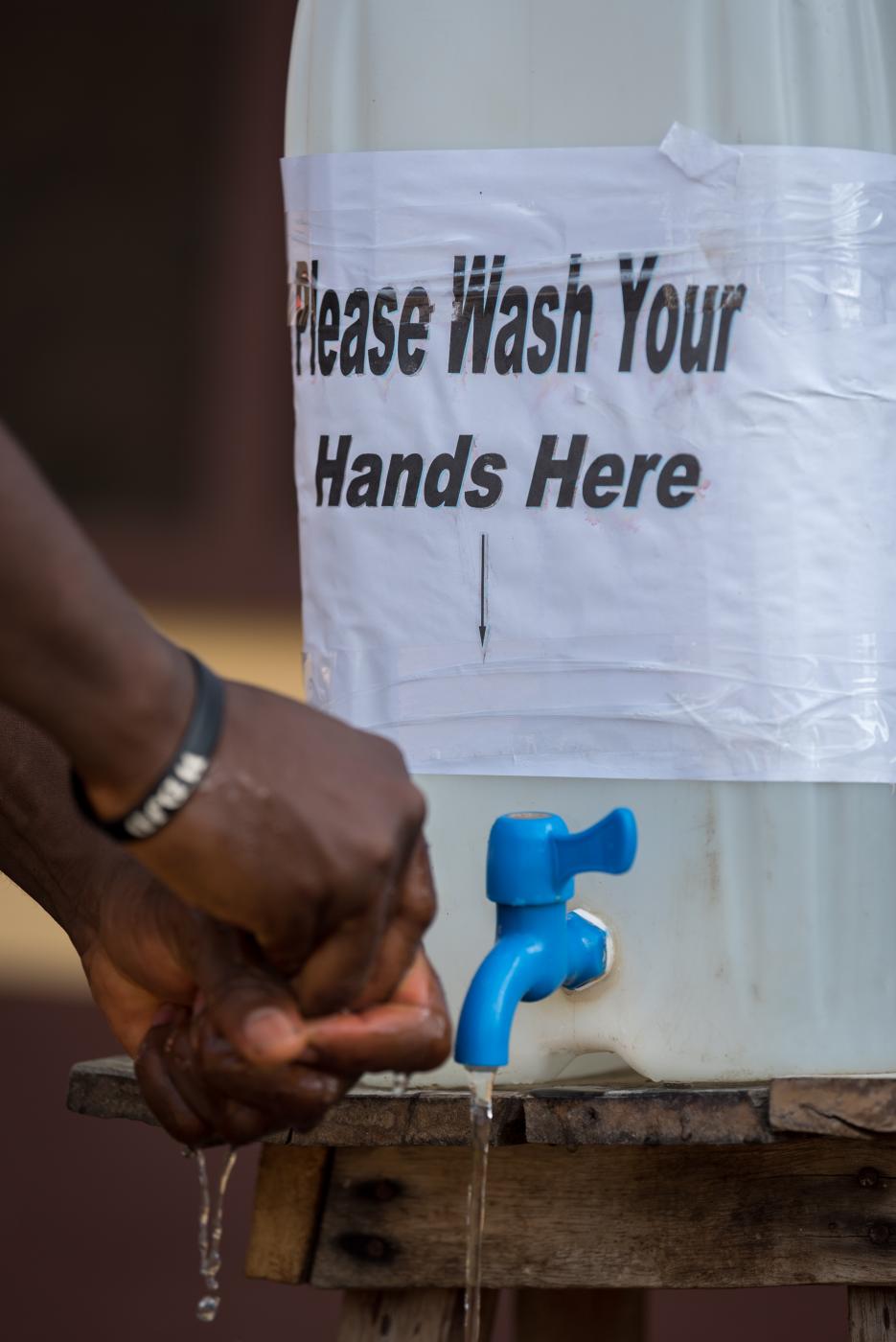 Hands are washed as a precaution, Ganta, Liberia, Photo: Albin Hillert