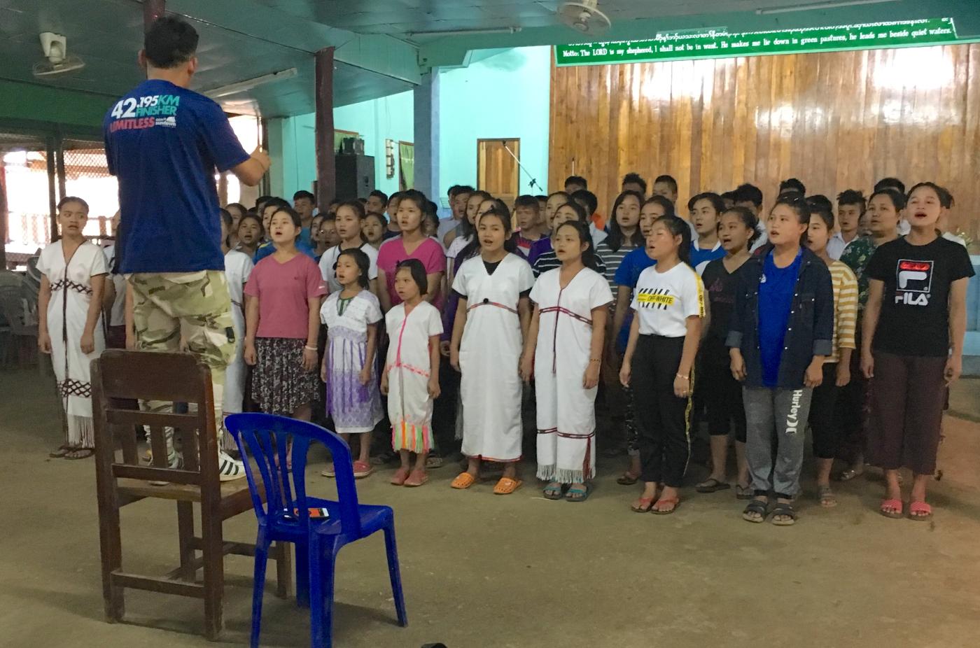 Youth choir singing at Mae La refugee camp in Thailand