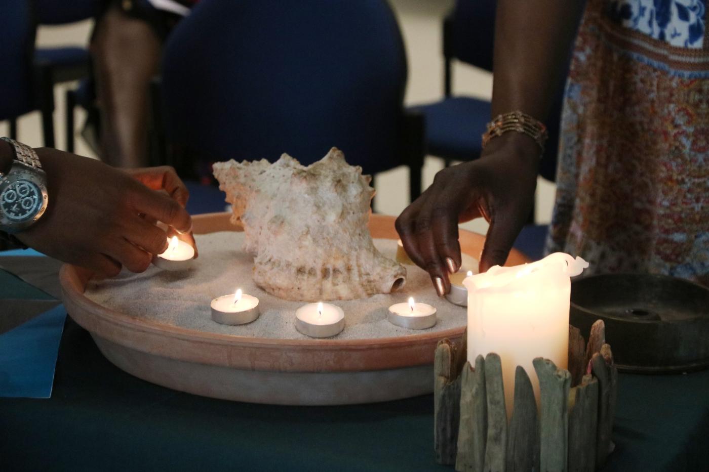 Burning candles, sea-shell, Ecumenical centre chapel