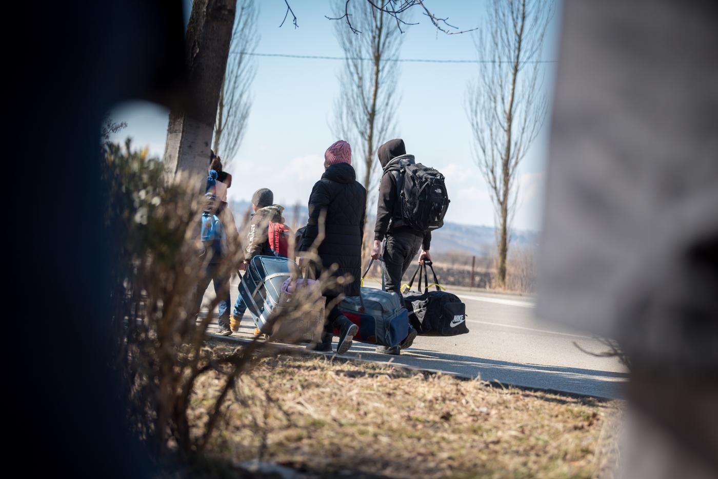 A refugee family from Ukraine arrives at border crossing in Romania