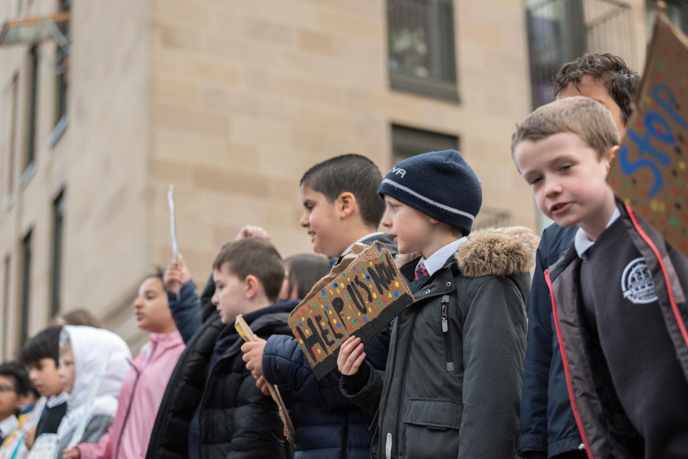 A group of young children speak out to stop climate change, as under a 'call to #UprootTheSystem', Fridays for Future, Glasgow, Scotland, United Kingdom, 2021, Photo: Albin Hillert/Life on Earth Pictures