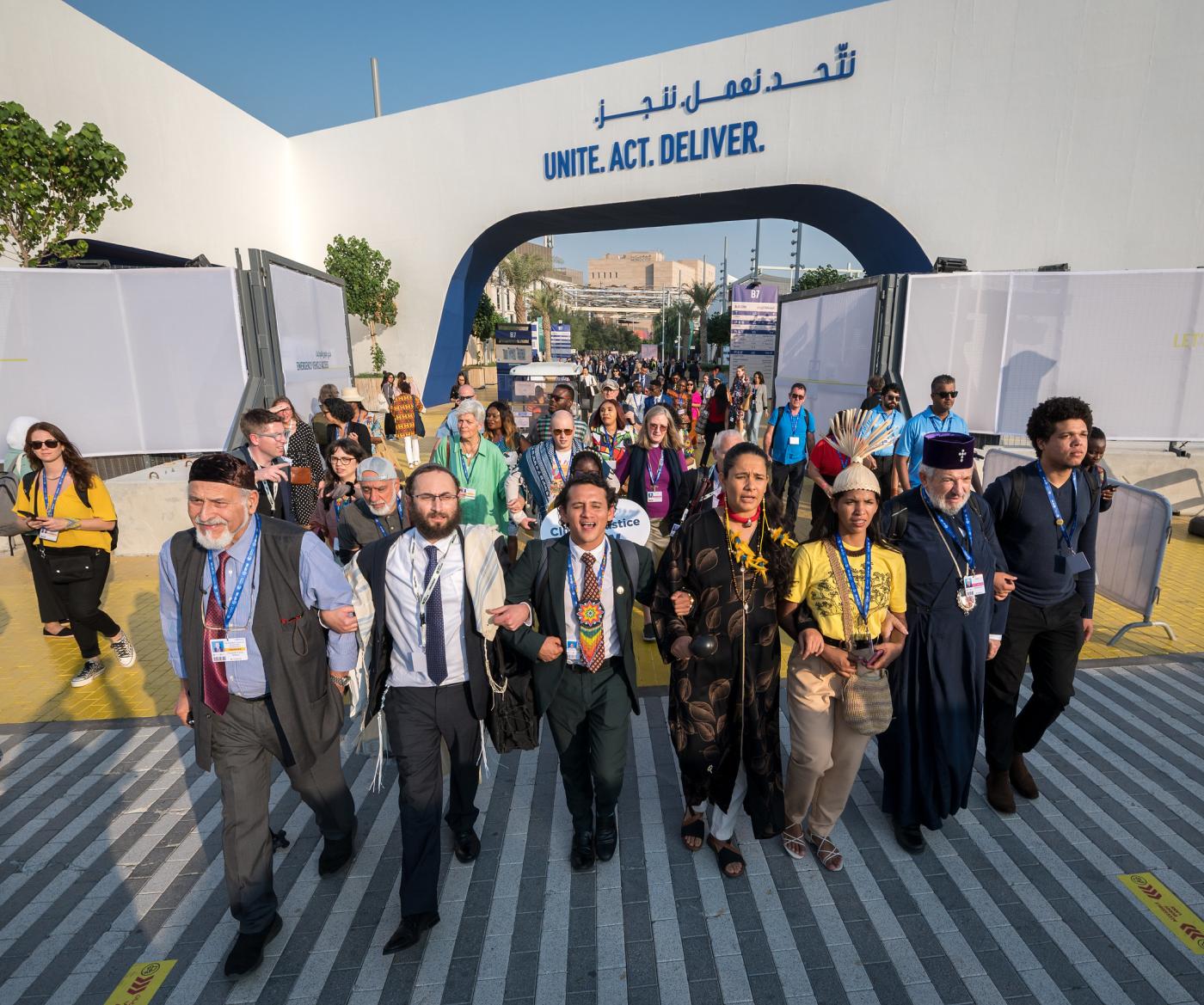 People from a variety of faith traditions gather at the United Nations climate summit COP28