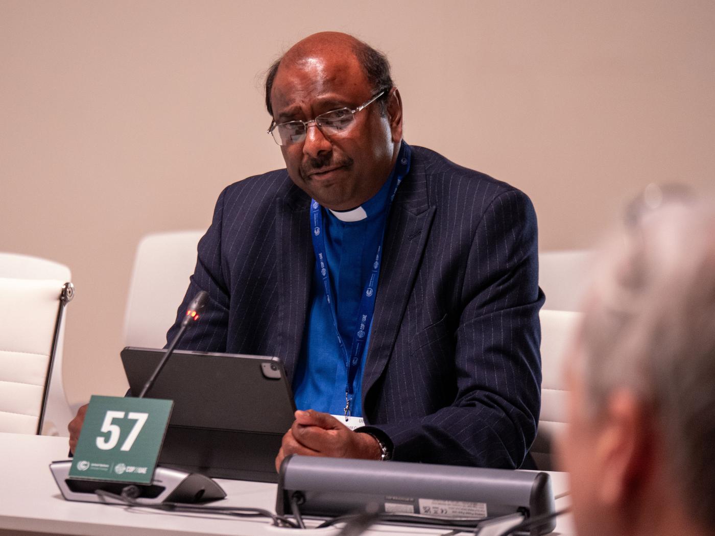 WCC general secretary Rev. Prof. Dr Jerry Pilay speaks at a side event of COP28 in Dubai, United Arab Emirates.