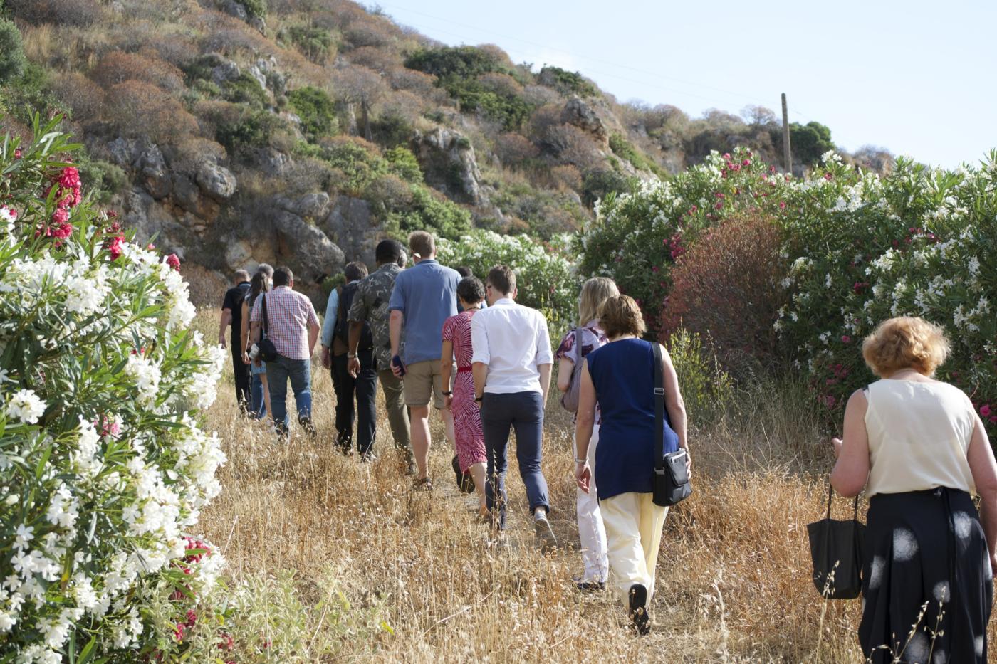 Participants of the Working Group on Climate Change on pilgrimage towards mountain chapel near the Orthodox Academy of Crete. © Albin Hillert/WCC 