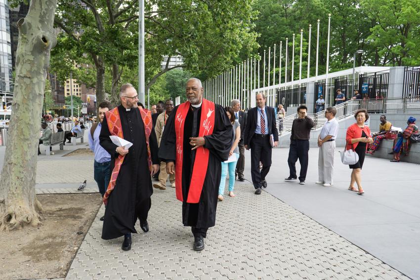 Religious leaders walk from the UN headquarters to the chapel at the Church Center for an Interfaith Prayer Service held 7 June in advance of the HLM.