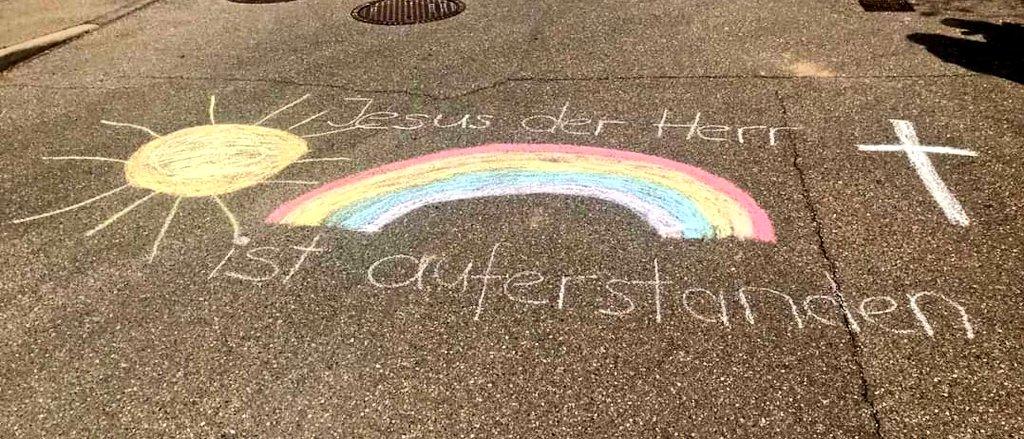Silent flashmob in Lenningen, Germany: As parishioners cannot meet at church, they wrote the traditional Easter greeting on their driveways