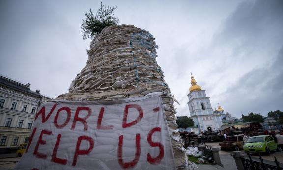 Kyiv, Ukraine: 'World, Help us' sign