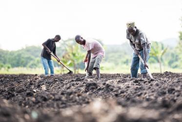 Farmers prepare the field in Usa River, Arusha, supported by the Sustainable Livelihood programme of the Evangelical Lutheran Church in Tanzania
