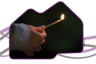 Lighting a small candle