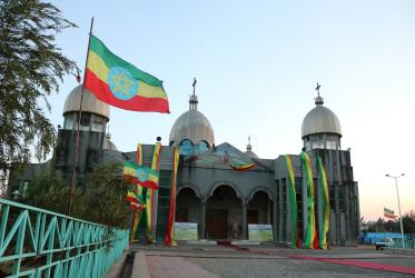 Ethiopian flag in front of the St. Mary's cathedral, Addis Ababa, Ethiopia.