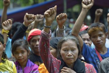 Indigenous people raise clenched fists during a demonstration in Koronadal City, on the southern Philippine island of Mindanao.