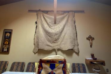 Luke’s Winter Count displayed at St. Luke’s Episcopal Church with a par flesh Gospel Book on the Altar.