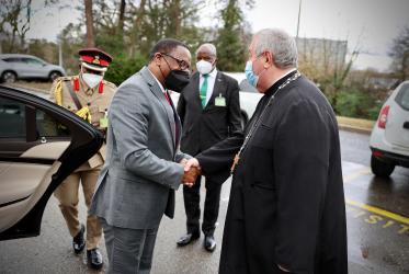 WCC acting general secretary meeting the president of Malawi outside the Ecumenical centre