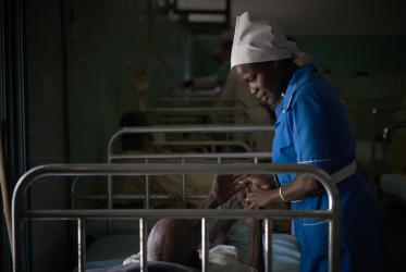 Nurse Nacima Keni examines a patient in the Mother of Mercy Hospital in Gidel, a village in the Nuba Mountains of Sudan. The area is controlled by the Sudan People's Liberation Movement-North, and frequently attacked by the military of Sudan. The Catholic hospital is the only referral hospital in the war-torn area.