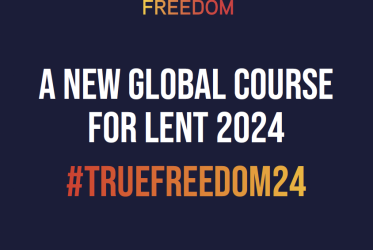 Dark blue book cover with a dove and the words "True Freedom: A New Global Course for Lent 2024 "