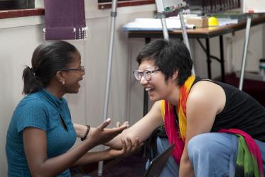 Former intern Su Hyun Lim (right) in conversation with Maggie Mwape. Photo: WCC/LWF/W. Noack