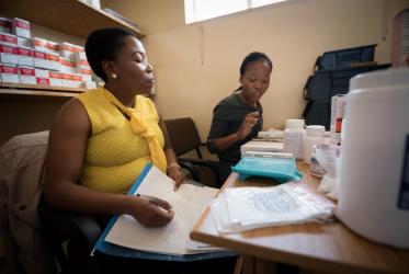Nurses distribute HIV medication at Saint Joseph’s Hospital in Lesotho. © Albin Hillert/WCC