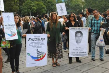 Participants in a demonstration during the day of action and justice for Ayotzinapa disappeared students in Mexico. © WSCF