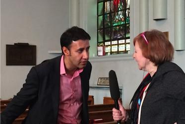 Arif Virani speaks with reporter Maureen Brosnahan about Roma family case. © Kristine Greenaway