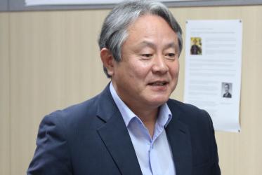 Le pasteur Hong-Jung Lee, secrétaire général du Conseil national des Églises en Corée. Photo: Grégoire de Fombelle/COE, 2019