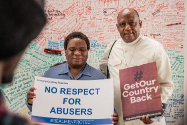 Mr Masimba Kuchera, CCIA, and Bishop Victor Phalana of the Catholic Diocese of Klerksdorp commit to speak out against gender-based violence. Photo: Hymie Sokupha/WCC