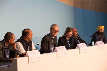 Rev. Henrik Grape (C), coordinator of the WCC Working Group on Climate Change, was one of the speakers of the panel. ©Sean Hawkey/WCC