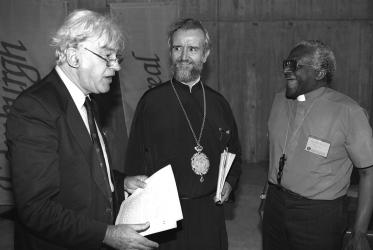Left to right: Rev. Dr Günther Gassmann, H.E. Metr. John of Pergamon (Zizioulas) and Archbishop Desmond Tutu, during the Fifth Conference on Faith and Order, held in Santiago de Compostela, Spain (3-14 August 1993). ©Peter Williams/WCC