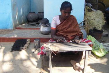 A woman works on making incense in a Dalit village in India, October 2007. Photo: Christina Biere/WCC