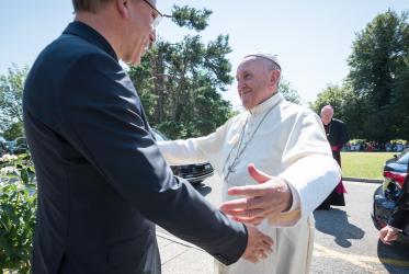 WCC general secretary Rev. Dr Olav Fykse Tveit greets Pope Francis as he arrives at the Ecumenical Centre in Geneva. Photo: Albin Hillert/WCC