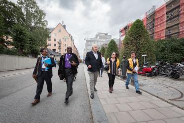 Water and Faith day participants walk through central Stockholm after the public showcase. Photo: Albin Hillert/WCC