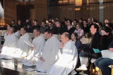 Taizé community participating in the morning prayer at the Ecumenical Centre in Geneva, 2 March 2012.